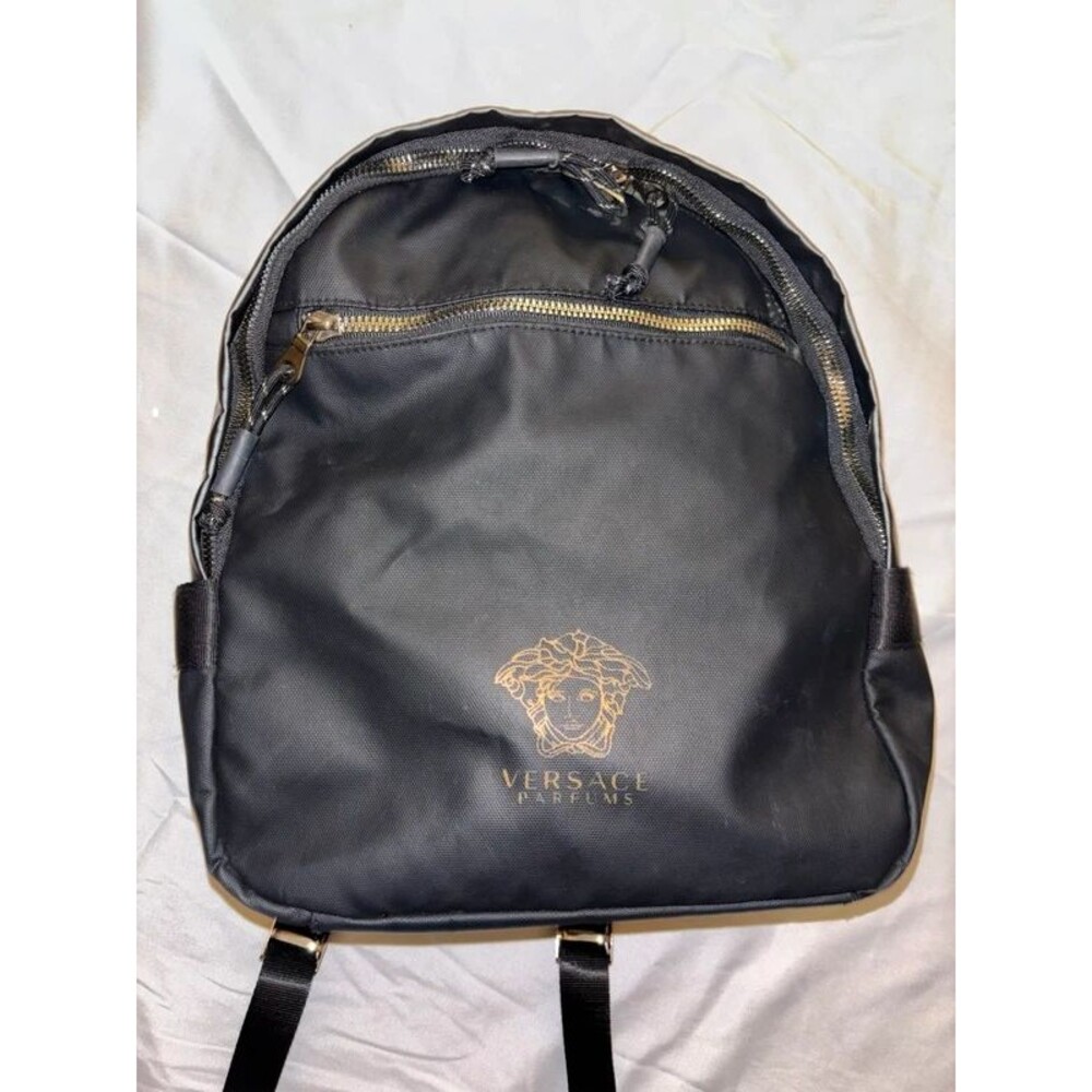 Black nylon Versace Parfums backpack Gold hardware.